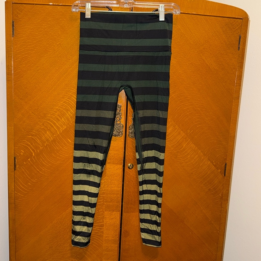 K-Deer green stripped tights .